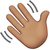 Apple waving hand: medium skin tone