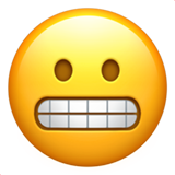 Apple grimacing face