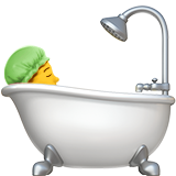 Apple person taking bath