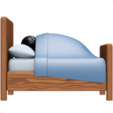 Apple person in bed