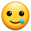 Samsung smiling face with tear