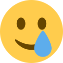 Twitter smiling face with tear